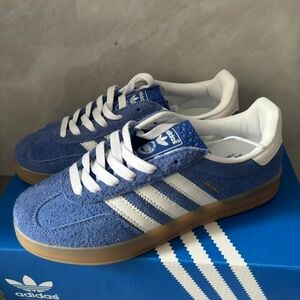 Adidas women try on sneakers